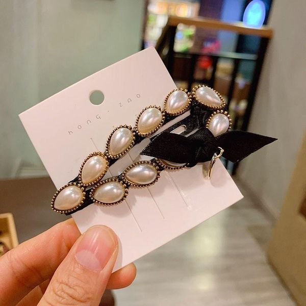 hair accessories temperament female vintage imitation pearl bow bb clip korean fashion women girl hairpins headwear
hair accessories temperament female vintage imitation pearl bow bb clip korean fashion women girl hairpins headwear
