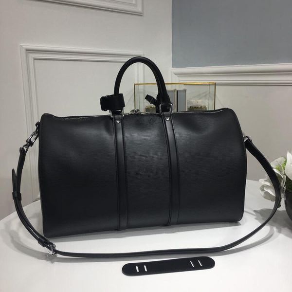 45*27cm womens capacity bag travelling 2020 mens large duffel bags baggage genuine leather bag fashion luggage handbag outdoor mukk +it2j
45*27cm womens capacity bag travelling 2020 mens large duffel bags baggage genuine leather bag fashion luggage handbag outdoor mukk +it2j