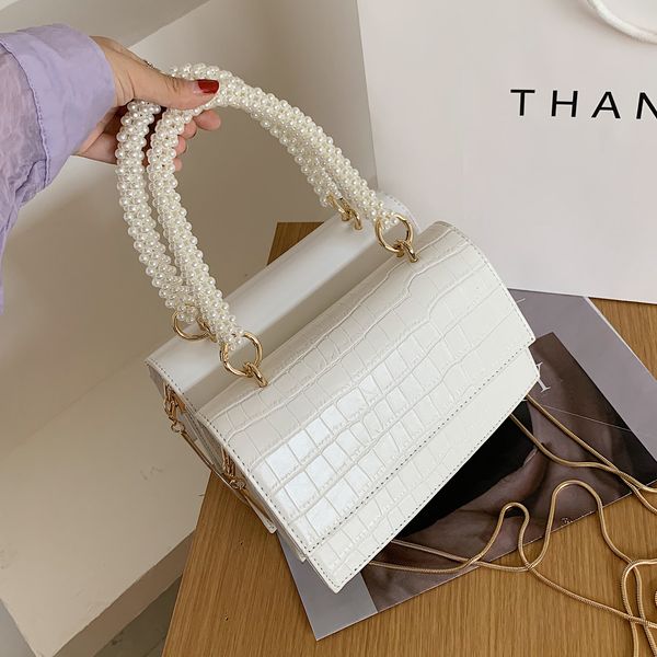 pearl handle small pu leather crossbody bags for women 2020 elegant solid color shoulder handbags female travel totes c1019
pearl handle small pu leather crossbody bags for women 2020 elegant solid color shoulder handbags female travel totes c1019