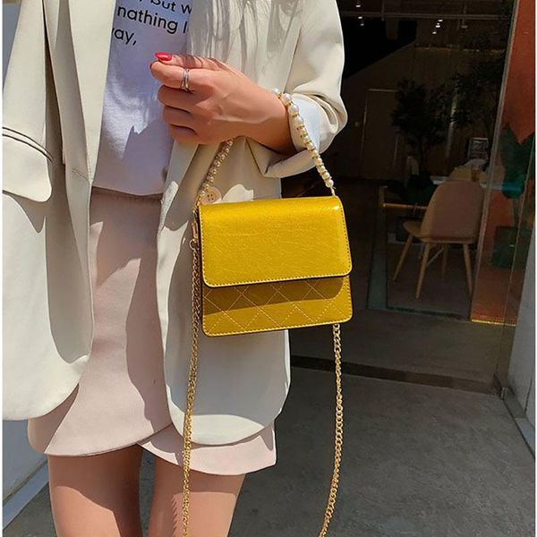 кожа pu женская crossbody сумка цепи сумки на ремне для женщин pearl плечевой ремень дамы кошелек и сумка болса
кожа pu женская crossbody сумка цепи сумки на ремне для женщин pearl плечевой ремень дамы кошелек и сумка болса