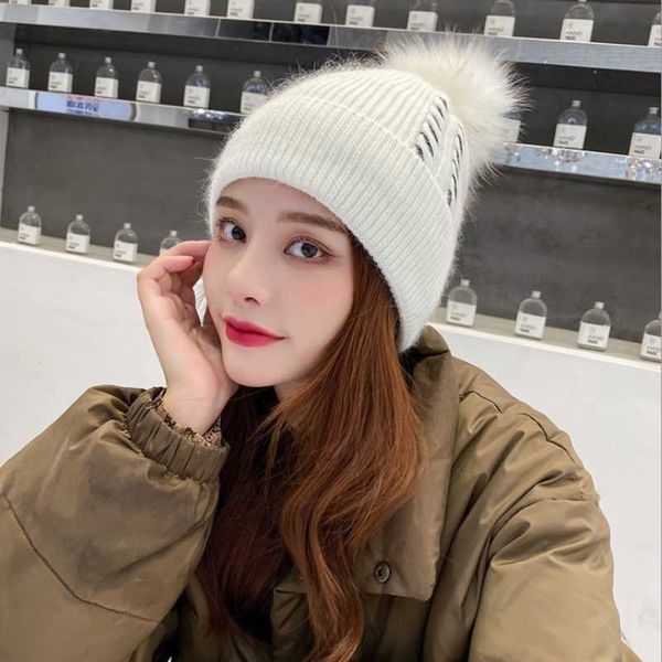 winter female fur pom pom hat winter hat for women girl 's knitted cap thick women beanies, Blue;gray
winter female fur pom pom hat winter hat for women girl 's knitted cap thick women beanies, Blue;gray