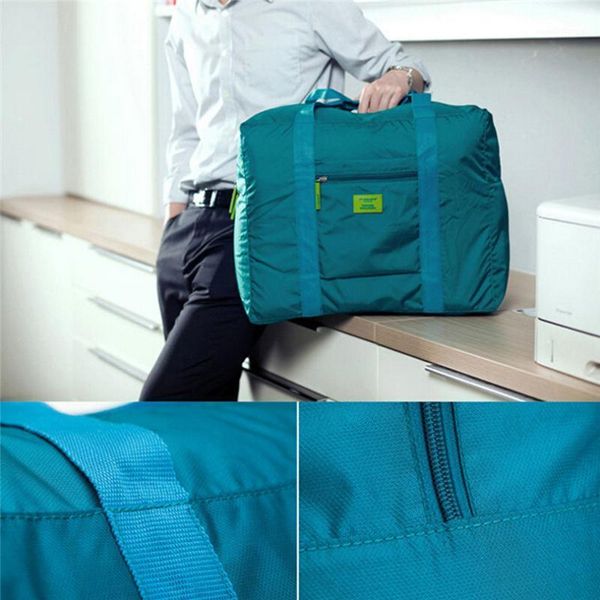 waterproof nylon folding large storage travel luggage nylon carry-on organizer handing shoulder storage bags clothes sorting bag1
waterproof nylon folding large storage travel luggage nylon carry-on organizer handing shoulder storage bags clothes sorting bag1