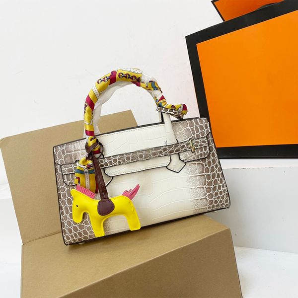 famous french designer fashion shoulder bag leather + pendant + silk scarf women's handbag luxury large capacity 30cm multicolor crossb
famous french designer fashion shoulder bag leather + pendant + silk scarf women's handbag luxury large capacity 30cm multicolor crossb