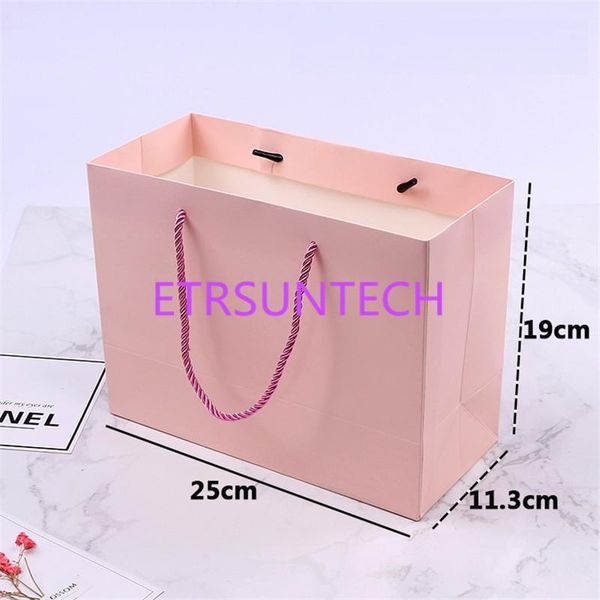 100pcs pink paper gift bag with handle 25*11.3*19cm /wedding birthday party gift package bags / christmas new year1
100pcs pink paper gift bag with handle 25*11.3*19cm /wedding birthday party gift package bags / christmas new year1