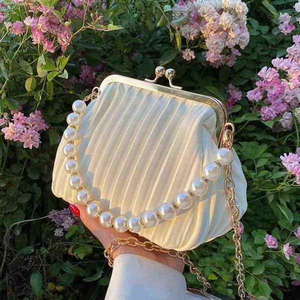 shopping bags pleated shell small with pearl handle summer pu leather women's designer handbag chain shoulder messenger 220303
shopping bags pleated shell small with pearl handle summer pu leather women's designer handbag chain shoulder messenger 220303