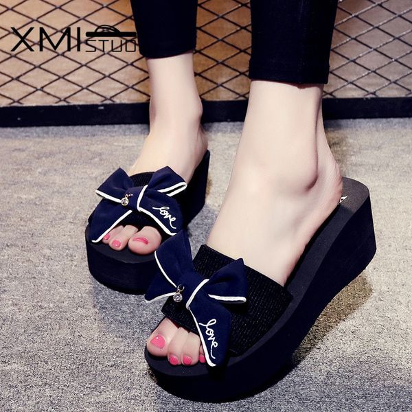 xmistuo summer women's wedges sandals slippers with bow slides outside .2cm high heels beach female slippers 4 color 7140w x1020, Black
xmistuo summer women's wedges sandals slippers with bow slides outside .2cm high heels beach female slippers 4 color 7140w x1020, Black