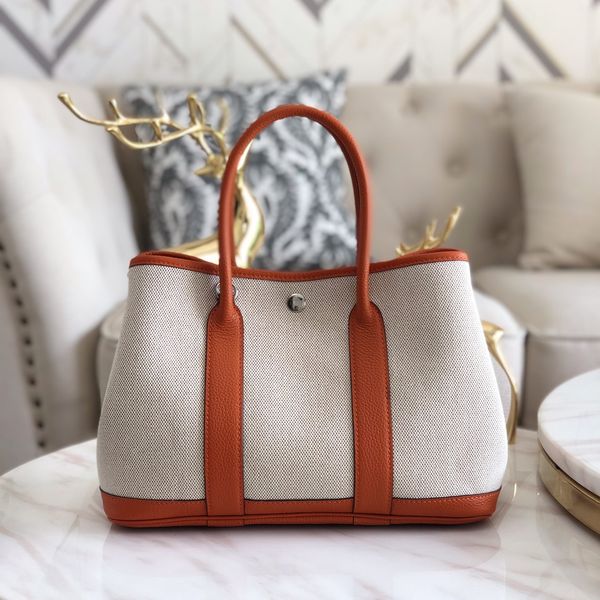 wholesale brown grey 6colors garden party bag, size30cm,togo leather+canvas, also have size 36cm with different price,many colors for chosen 
wholesale brown grey 6colors garden party bag, size30cm,togo leather+canvas, also have size 36cm with different price,many colors for chosen