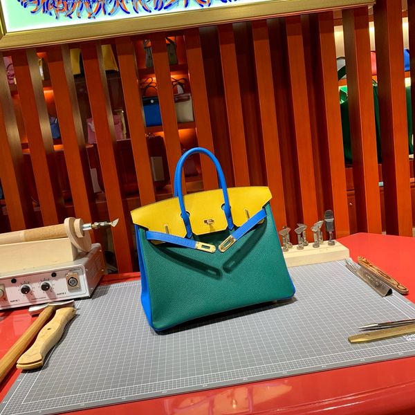 wholesale,half handmade epsom leather customer design bag30cm,wax thread,have gold and silver hardware,by order 10-15days,fast delivery
wholesale,half handmade epsom leather customer design bag30cm,wax thread,have gold and silver hardware,by order 10-15days,fast delivery