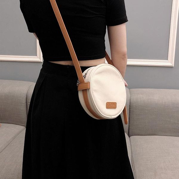 the new messenger small round bag mobile phone coin purse bag female small fresh and versatile canvas messenger shoulder
the new messenger small round bag mobile phone coin purse bag female small fresh and versatile canvas messenger shoulder