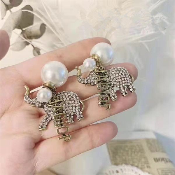 european and american classic vintage pearl earrings, celebrity girl full of diamond earrings simple letters, Silver
european and american classic vintage pearl earrings, celebrity girl full of diamond earrings simple letters, Silver