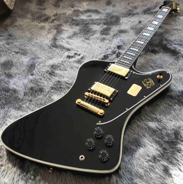 custom grand electric guitar in black with gold hardware
custom grand electric guitar in black with gold hardware