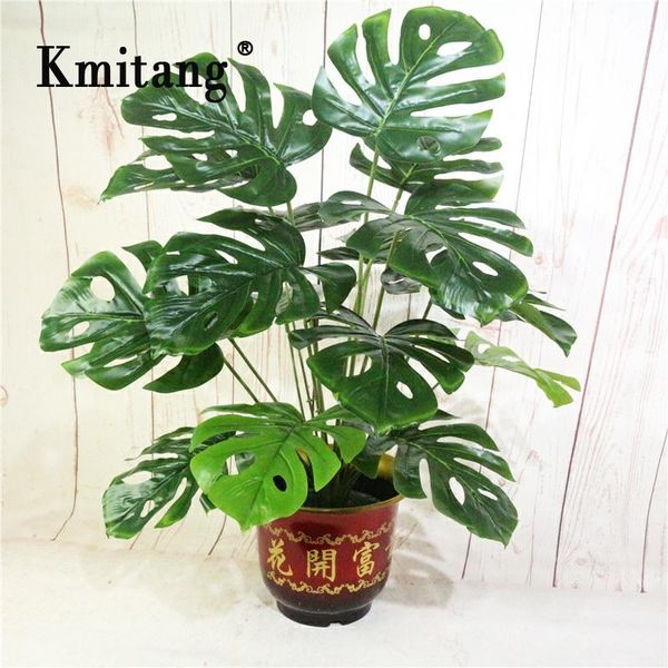 70cm 18 fork tropical monstera big artificial tree fake turtle leafs plastic leaves green palm plants for home office decoration 1029
70cm 18 fork tropical monstera big artificial tree fake turtle leafs plastic leaves green palm plants for home office decoration 1029