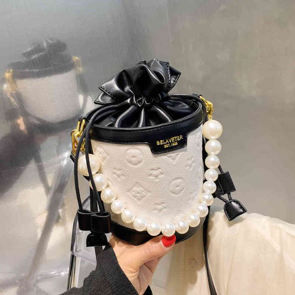2022 factory outlet feini beishi small fragrance pearl chain new fashionable summer bucket women's bag single shoulder messenger bag jj
2022 factory outlet feini beishi small fragrance pearl chain new fashionable summer bucket women's bag single shoulder messenger bag jj