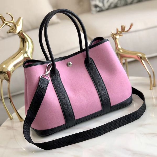 завод whosale дизайн handbag30cm, togo кожа + холст, полностью ручной работы, восковой нити, на складе, розовый, желтый, фуксия, черный 5col
завод whosale дизайн handbag30cm, togo кожа + холст, полностью ручной работы, восковой нити, на складе, розовый, желтый, фуксия, черный 5col