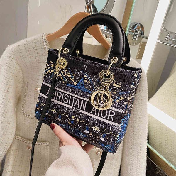 2022 latest luggage factory wholesale women's bag canvas printed hand-held