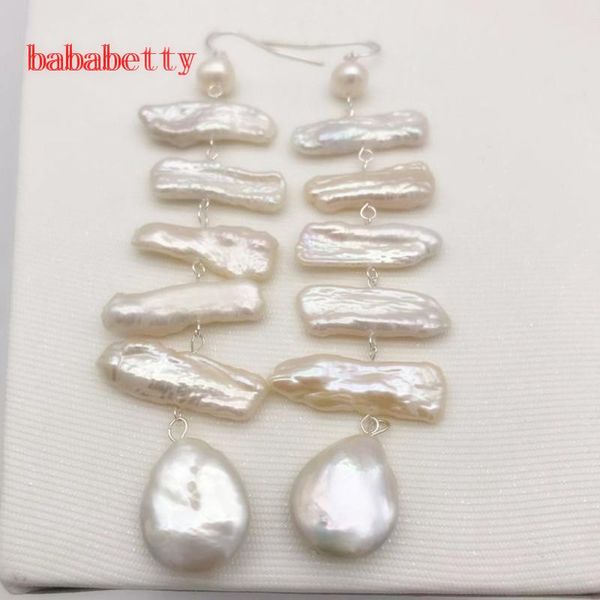 dangle & chandelier natural freshwater white pearl lute irregular twisted buckle earrings tibetan silver 9 cm long
dangle & chandelier natural freshwater white pearl lute irregular twisted buckle earrings tibetan silver 9 cm long