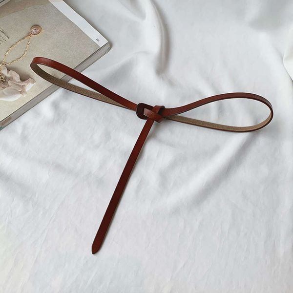 simple and versatile perforated lace up thin for women with skirt decoration dress casual pure cow leather small belt, Black;brown
simple and versatile perforated lace up thin for women with skirt decoration dress casual pure cow leather small belt, Black;brown