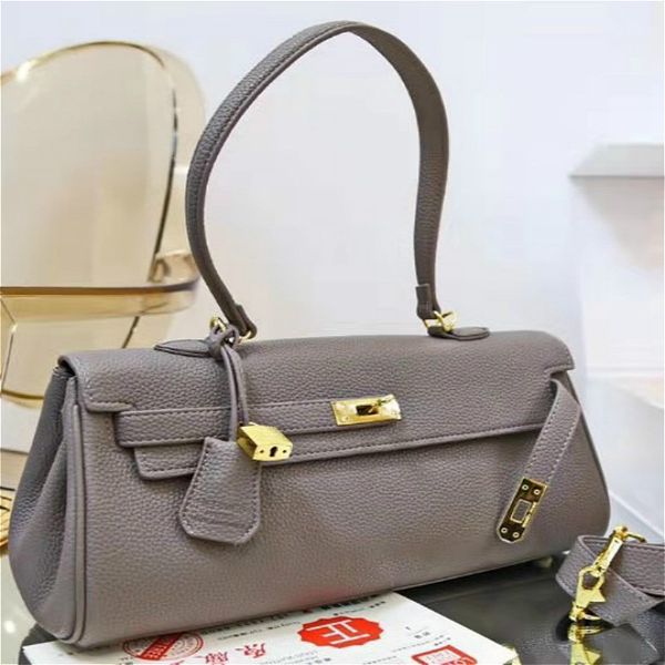 european and american large capacity handbag new design female kelly bag pochette tote shoulder underarm bags luxurys designers bag
european and american large capacity handbag new design female kelly bag pochette tote shoulder underarm bags luxurys designers bag