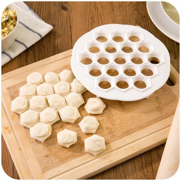 1 pcs 21x 2cm kitchen pastry tools diy white plastic dumpling mold maker dough press dumpling 19 holes dumplings maker mold1
1 pcs 21x 2cm kitchen pastry tools diy white plastic dumpling mold maker dough press dumpling 19 holes dumplings maker mold1