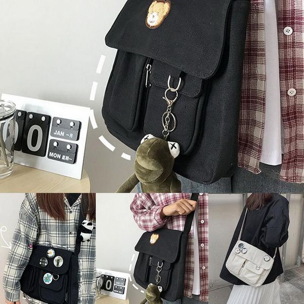 simple canvas bag casual shoulder bag fashion teenager schoolbag one-shoulder diagonal handbag with 4 cute badge a pendant
simple canvas bag casual shoulder bag fashion teenager schoolbag one-shoulder diagonal handbag with 4 cute badge a pendant