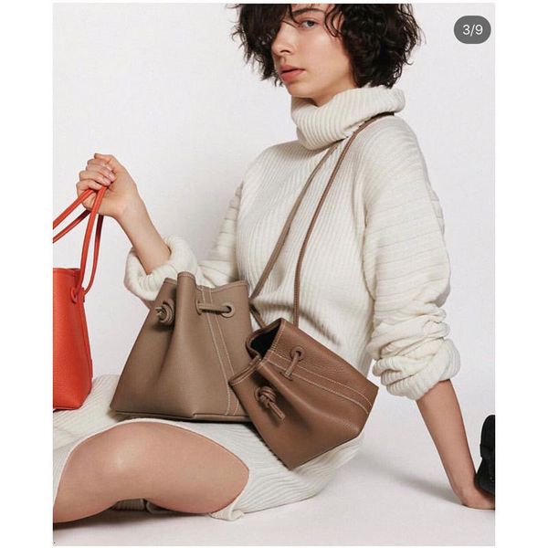 grass planting crowdsourcing cowhide drawstring bucket simple design durable real leather candy color women's bag
grass planting crowdsourcing cowhide drawstring bucket simple design durable real leather candy color women's bag