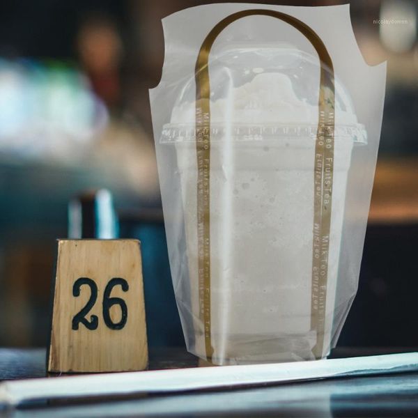 gift wrap 50pcs milk takeaway handbags pe transparent coffee drinks disposable takeout bags carry (single cup - golden edge)1
gift wrap 50pcs milk takeaway handbags pe transparent coffee drinks disposable takeout bags carry (single cup - golden edge)1