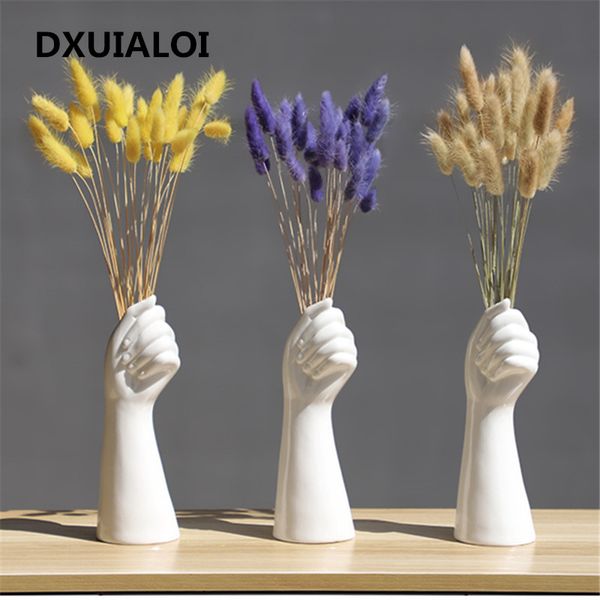 ceramics vase nordic style golden hand vase flowers modern home office decor of creative floral composition living room ornament
ceramics vase nordic style golden hand vase flowers modern home office decor of creative floral composition living room ornament