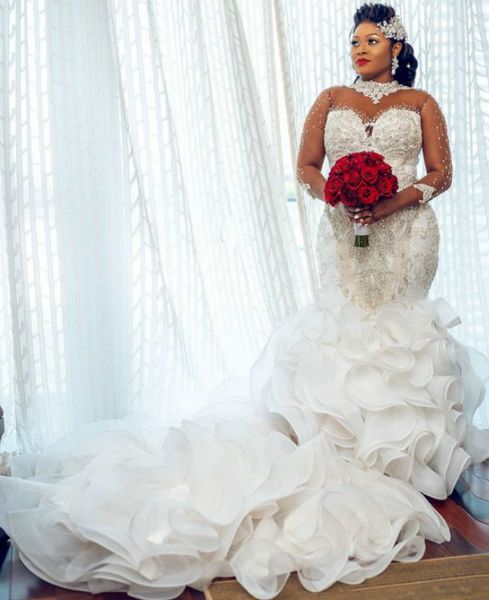 plus size arabic aso ebi luxurious crystals lace wedding dresses beaded sheer neck bridal dresses vintage wedding gowns zj243, White
plus size arabic aso ebi luxurious crystals lace wedding dresses beaded sheer neck bridal dresses vintage wedding gowns zj243, White