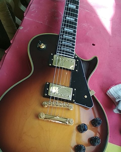 customized one piece maple tobacco sunburst electric guitar with ebony fretboard, fret nibs
customized one piece maple tobacco sunburst electric guitar with ebony fretboard, fret nibs