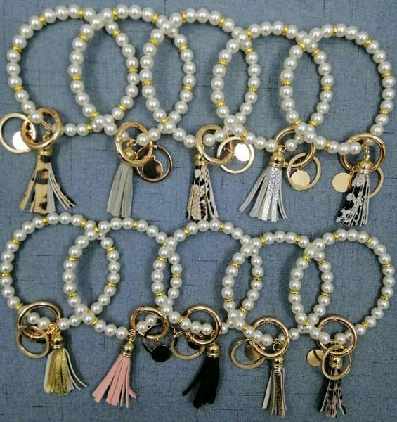 european and american creative fashion pearl bracelet ring keychain leopard print pure color pu leather tassel, Golden;silver
european and american creative fashion pearl bracelet ring keychain leopard print pure color pu leather tassel, Golden;silver