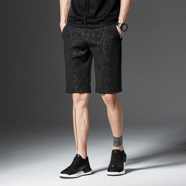 summer camouflage capris casual men's shorts korean loose sports trend beach pants, White;black
summer camouflage capris casual men's shorts korean loose sports trend beach pants, White;black