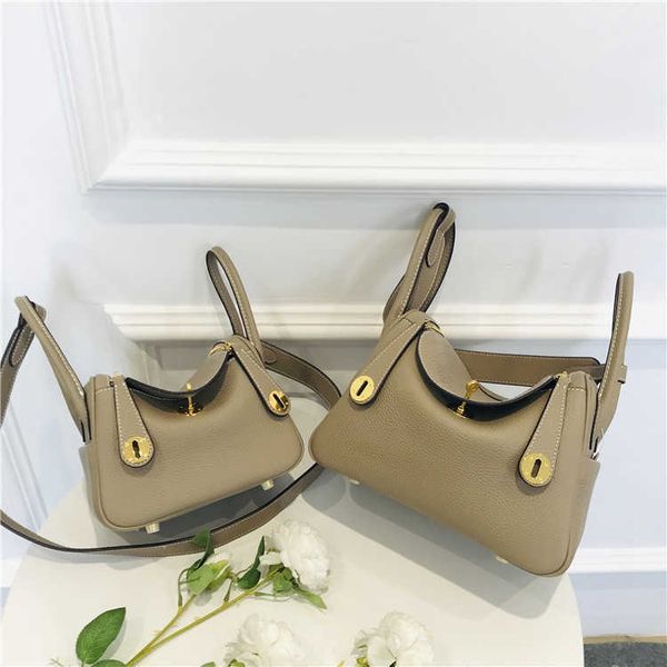 wholesale luxurys handbag fashion designer bag 2023 new lindi head layer cow leather mini gold button shoulder belt fashion sdf lnyc
wholesale luxurys handbag fashion designer bag 2023 new lindi head layer cow leather mini gold button shoulder belt fashion sdf lnyc