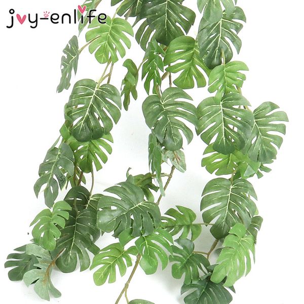 small fake silk tropical palm leaves vine artificial jungle turtle leaf rattan plants wedding home wall hanging decoration
small fake silk tropical palm leaves vine artificial jungle turtle leaf rattan plants wedding home wall hanging decoration