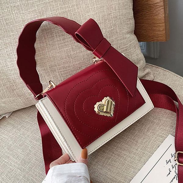 etaill contrast color bow handle crossbody bags for women 2020 luxury heart shape designer female shoulder messenger bag
etaill contrast color bow handle crossbody bags for women 2020 luxury heart shape designer female shoulder messenger bag