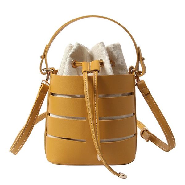 2020 summer new round women handbag hollow pu material small lady bag portable bucket bag casual lady shoulder messenger bags
2020 summer new round women handbag hollow pu material small lady bag portable bucket bag casual lady shoulder messenger bags