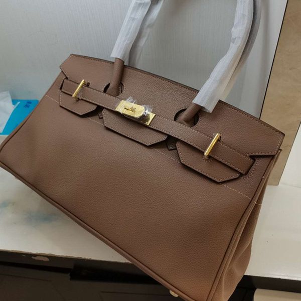 2020 autumn and winter new fashionable leather horizontal birkin bag underarm bag large capacity litchi grain cowhide handbags for women no
2020 autumn and winter new fashionable leather horizontal birkin bag underarm bag large capacity litchi grain cowhide handbags for women no