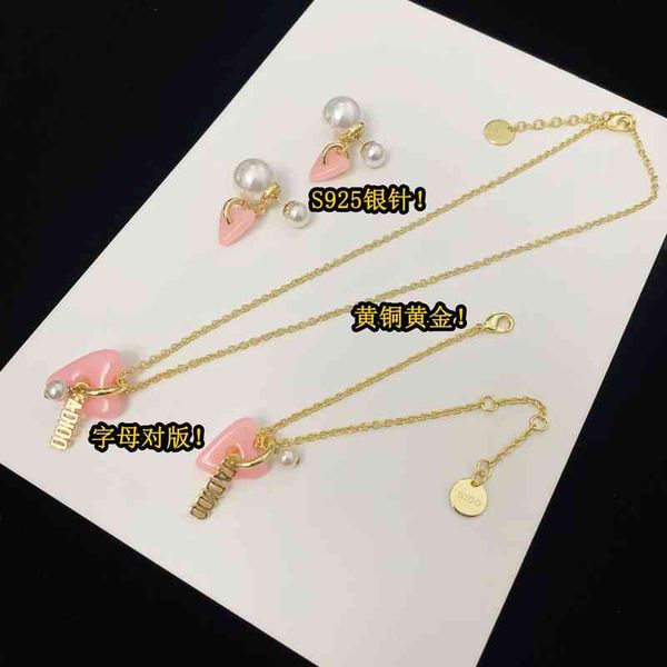 factory wholesale new love pearl earrings female brass heart pendant letter bracelet necklace set, Golden
factory wholesale new love pearl earrings female brass heart pendant letter bracelet necklace set, Golden