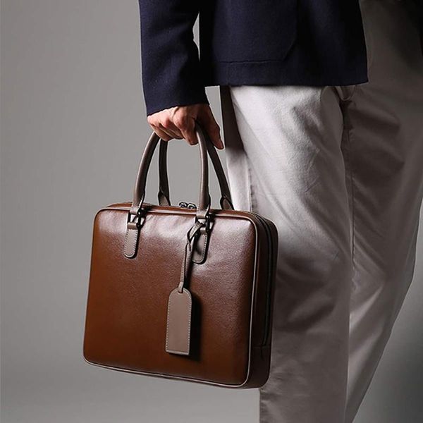 new men's briefcase business handbag pu leathar large capacity lapbag a4 magazine and document storage portable office bag
new men's briefcase business handbag pu leathar large capacity lapbag a4 magazine and document storage portable office bag