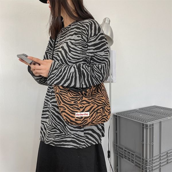 fashion women zebra pattern handbag portable canvas shoulder messenger dumpling bag commuter totes school shoulder clutch
fashion women zebra pattern handbag portable canvas shoulder messenger dumpling bag commuter totes school shoulder clutch