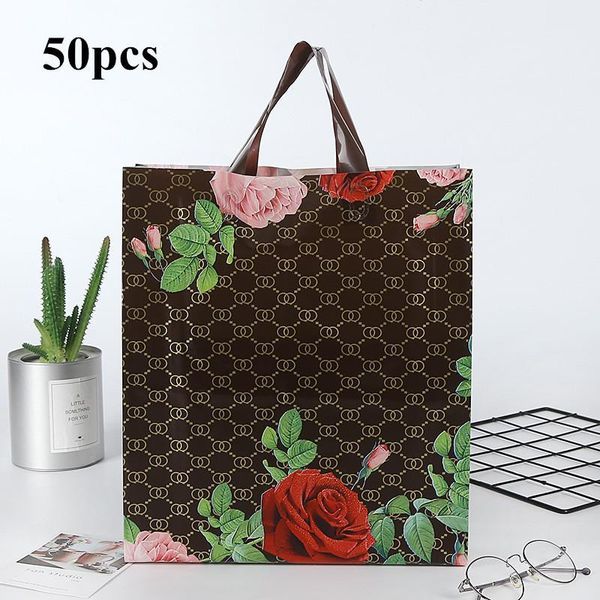 50pc / lot rose pattern plastic gift bags thick portable storage shopping bags clothing store wedding party supplies1
50pc / lot rose pattern plastic gift bags thick portable storage shopping bags clothing store wedding party supplies1