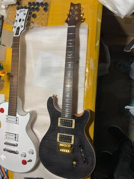 stock flame maple prs black 6 strings electric guitar prs flame maple rosewood fingerboard made in china small tremolo bridge
stock flame maple prs black 6 strings electric guitar prs flame maple rosewood fingerboard made in china small tremolo bridge