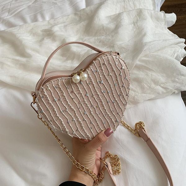 new small bag female 2020 summer new wave korean version of the wild messenger bag chain girl heart fashion handbag
new small bag female 2020 summer new wave korean version of the wild messenger bag chain girl heart fashion handbag