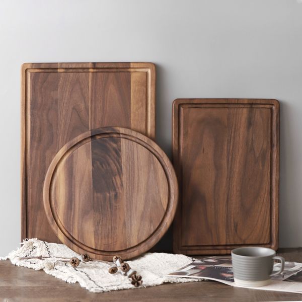 black walnut round pizza chopping board with handle solid wood unpainted household cutting board slotted steak plate bread
black walnut round pizza chopping board with handle solid wood unpainted household cutting board slotted steak plate bread