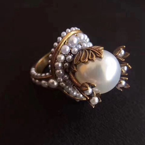 februaryfrost brand designer sales brass large bling pearl leaves finger ring gu vintage petal flower finger ring party wedding cool jewelry, Golden;silver
februaryfrost brand designer sales brass large bling pearl leaves finger ring gu vintage petal flower finger ring party wedding cool jewelry, Golden;silver