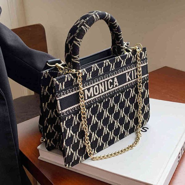 2022 latest models handbag wholesale large capacity women's broadband autumn winter canvas chain portable tote
2022 latest models handbag wholesale large capacity women's broadband autumn winter canvas chain portable tote
