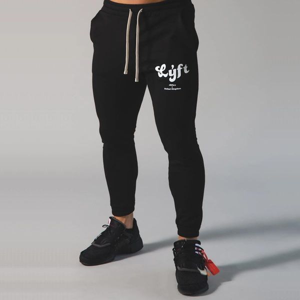men's pants muscular fitness spring and autumn sports track field running foot zipper casual tide, Black
men's pants muscular fitness spring and autumn sports track field running foot zipper casual tide, Black