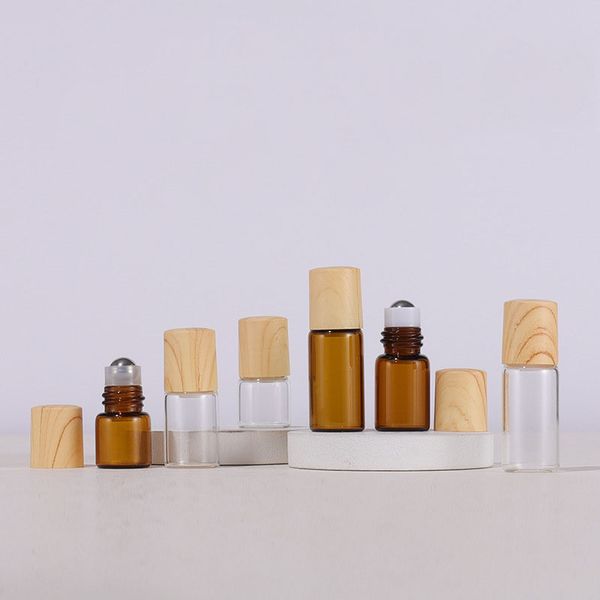 empty amber clear glass roll bottle 1ml 2ml 3ml 5ml refillable roller perfume bottles with plastic wooden grain cap for travel cosmetic
empty amber clear glass roll bottle 1ml 2ml 3ml 5ml refillable roller perfume bottles with plastic wooden grain cap for travel cosmetic