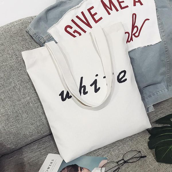 storage bags women cute simple solid color style canvas shopping handbag lady shoulder bag wild letter print large capacity bags1
storage bags women cute simple solid color style canvas shopping handbag lady shoulder bag wild letter print large capacity bags1
