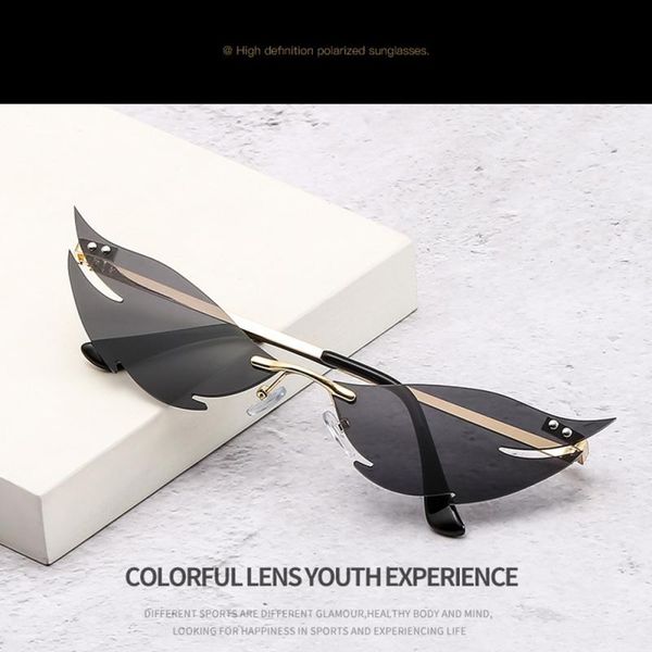 5 colors new driving woman man frameless fish small sunglasses designer creativity shark shape glasses
5 colors new driving woman man frameless fish small sunglasses designer creativity shark shape glasses
