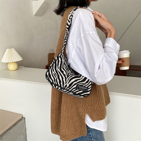 vintage animal pattern underarm shoulder bags canvas women travel handbags totes fashion exquisite shopping bag
vintage animal pattern underarm shoulder bags canvas women travel handbags totes fashion exquisite shopping bag